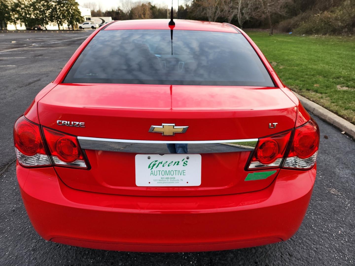 2014 RED /Gray Chevrolet Cruze 1LT Auto (1G1PC5SB0E7) with an 1.4L L4 DOHC 16V TURBO engine, 6-Speed Automatic transmission, located at 1221 Madison St., Shelbyville, TN, 37160, (931) 680-9439, 0.000000, 0.000000 - Photo#2